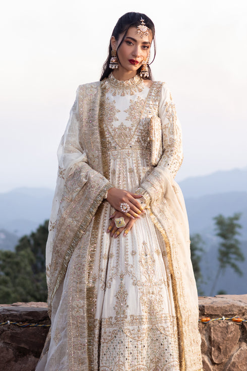Macro of Naqshi Fasana bodice highlighting dense hand‑adda embroidery with crystals, cut‑dana, naqshi and mirror embellishments across halter and yoke.